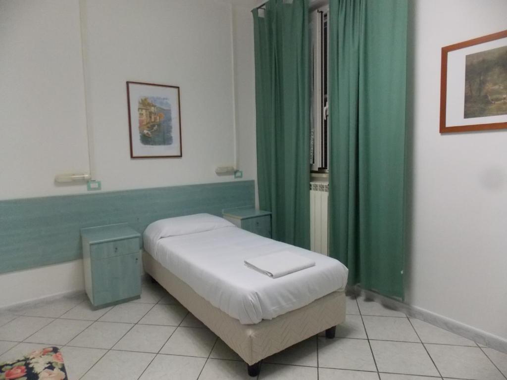 Postel nebo postele na pokoji v ubytování Hotel Villa dei Butteri - Aprilia
