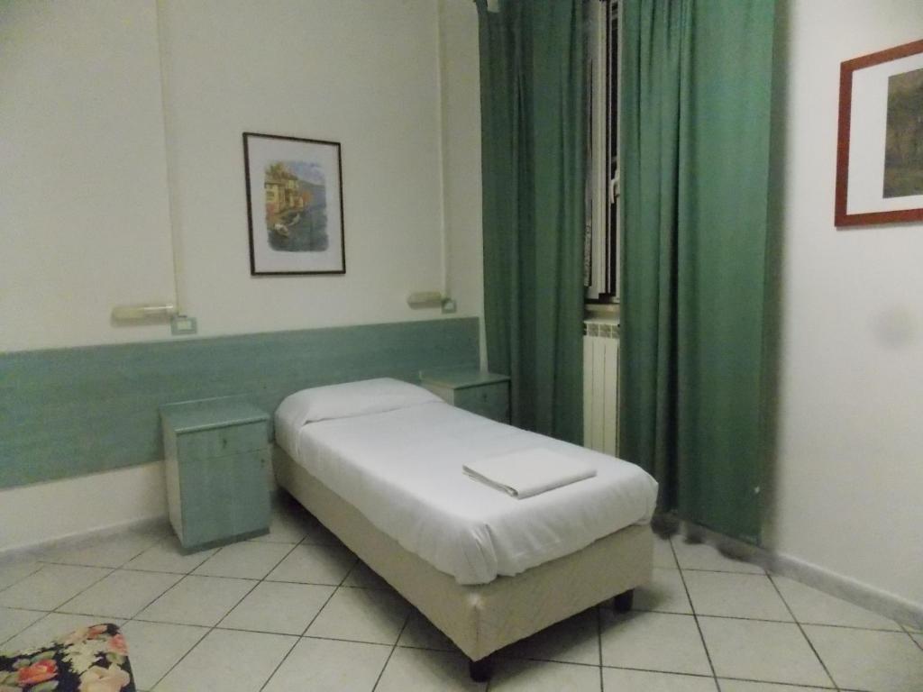 Postel nebo postele na pokoji v ubytování Hotel Villa dei Butteri - Aprilia