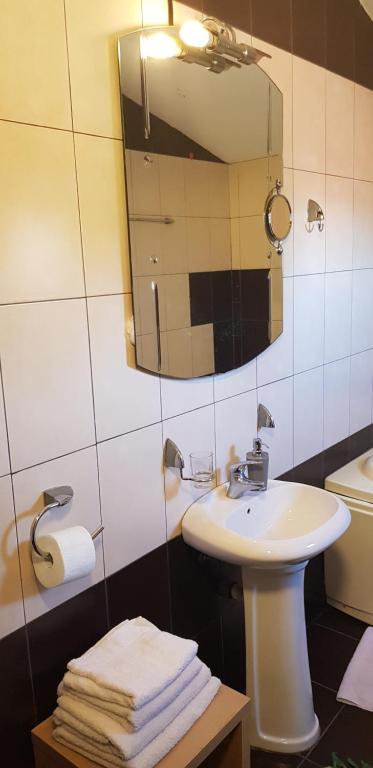 Koupelna v ubytování Apartments Agape
