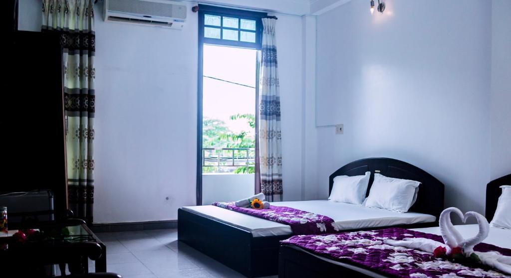 Thanh An 2 Guesthouse - Family Room With Balcony