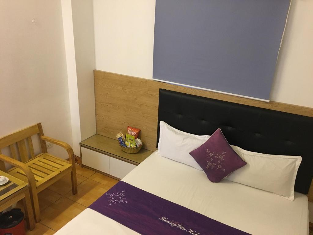 Postel nebo postele na pokoji v ubytování Hotel Hoang Gia