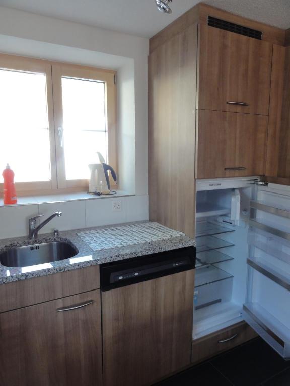 Kuchyň nebo kuchyňský kout v ubytování Chalet Schönbühl