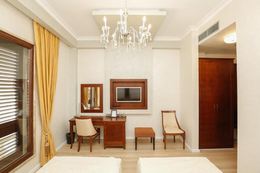 TV a/nebo společenská místnost v ubytování Oxford hotel