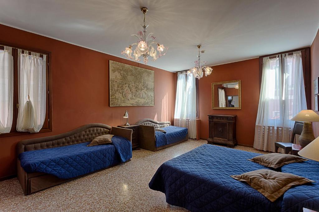 Postel nebo postele na pokoji v ubytování Hotel Guerrato