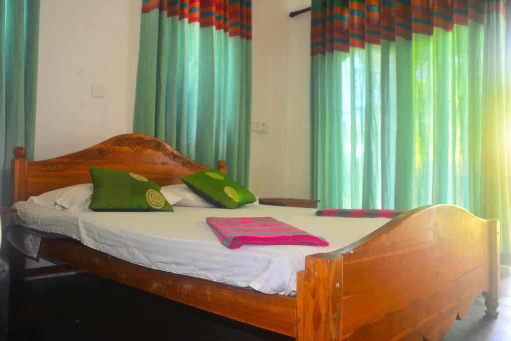 Postel nebo postele na pokoji v ubytování Hideaway Homestay Habarana