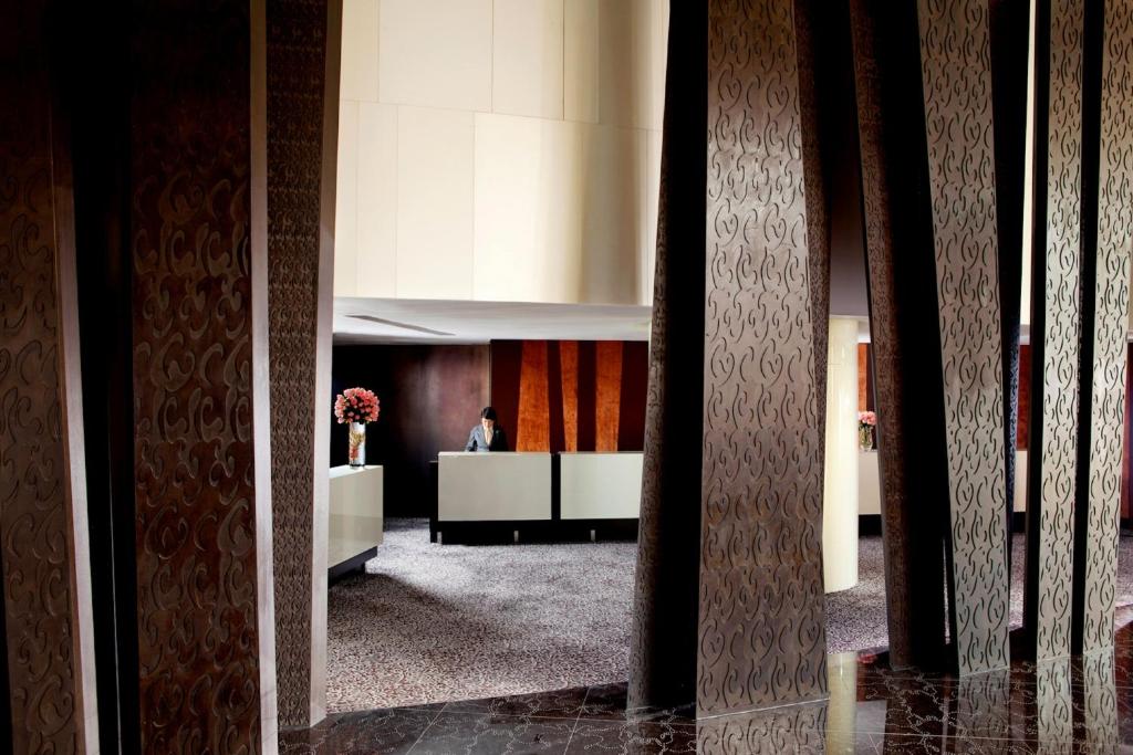 Postel nebo postele na pokoji v ubytování The Langham, Shanghai, Xintiandi