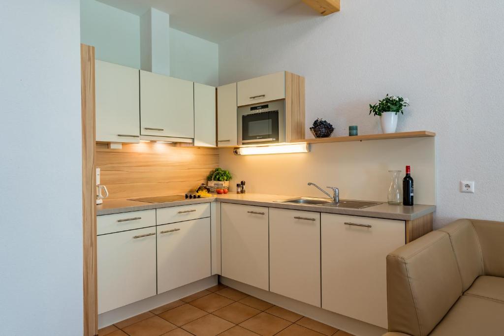 Kuchyňa alebo kuchynka v ubytovaní Ferienhäuser Tröster
