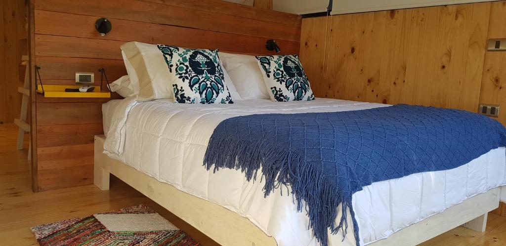 Postel nebo postele na pokoji v ubytování Lodge KARKÚ