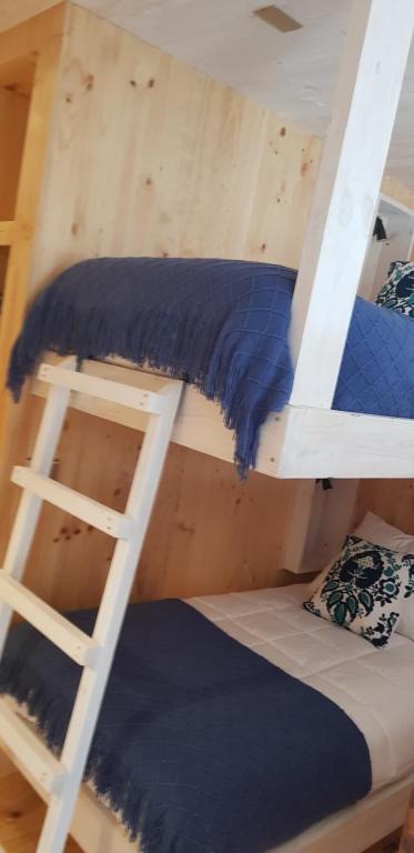 Postel nebo postele na pokoji v ubytování Lodge KARKÚ