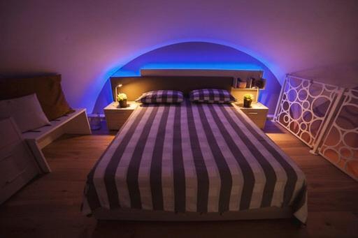 Postel nebo postele na pokoji v ubytování OroVerde Rooms & Suite nel cuore di Trani