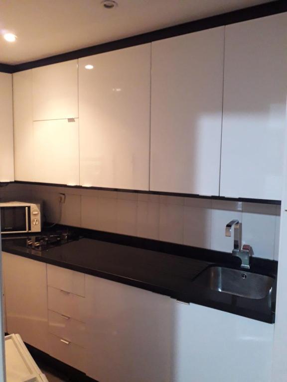 Kuchyň nebo kuchyňský kout v ubytování Two Bedrooms Leonor Davalos 2