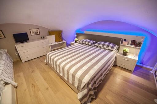 Postel nebo postele na pokoji v ubytování OroVerde Rooms & Suite nel cuore di Trani