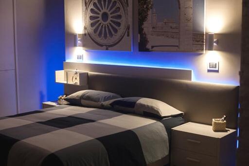 Postel nebo postele na pokoji v ubytování OroVerde Rooms & Suite nel cuore di Trani