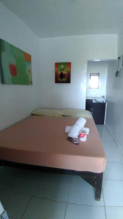 Postel nebo postele na pokoji v ubytování Dahilig Resort