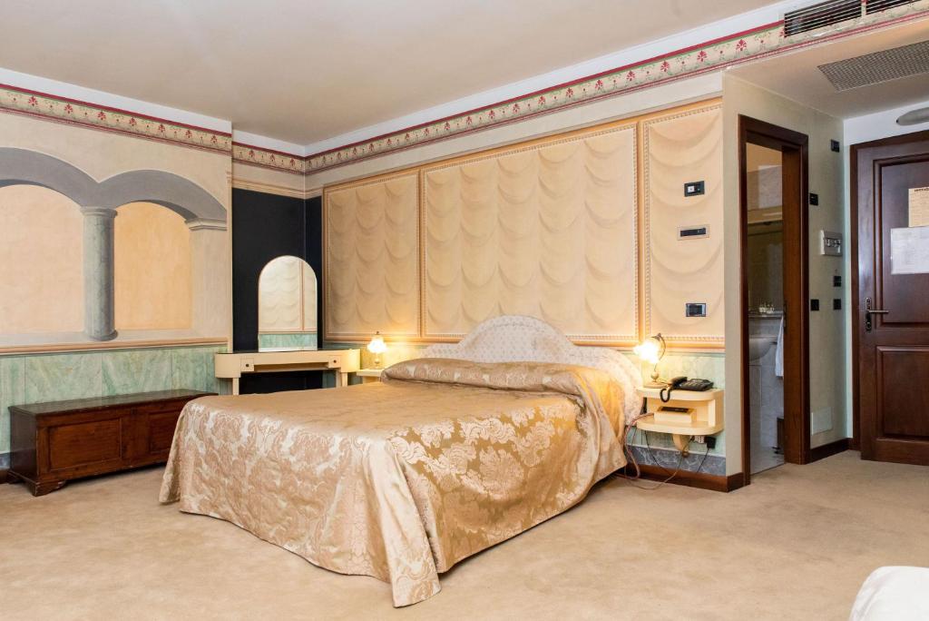 Postel nebo postele na pokoji v ubytování Hotel Fonte Cesia