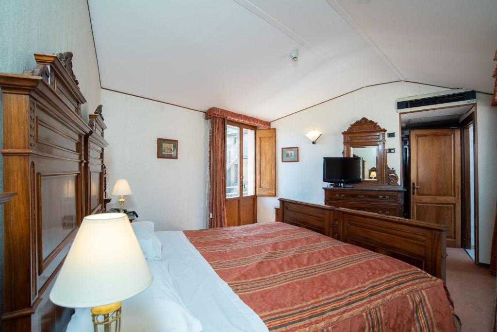 Postel nebo postele na pokoji v ubytování Hotel Fonte Cesia