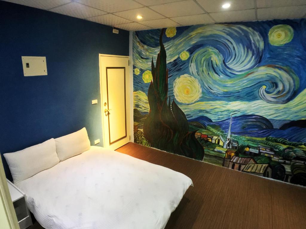 Postel nebo postele na pokoji v ubytování Fengchia Oslo