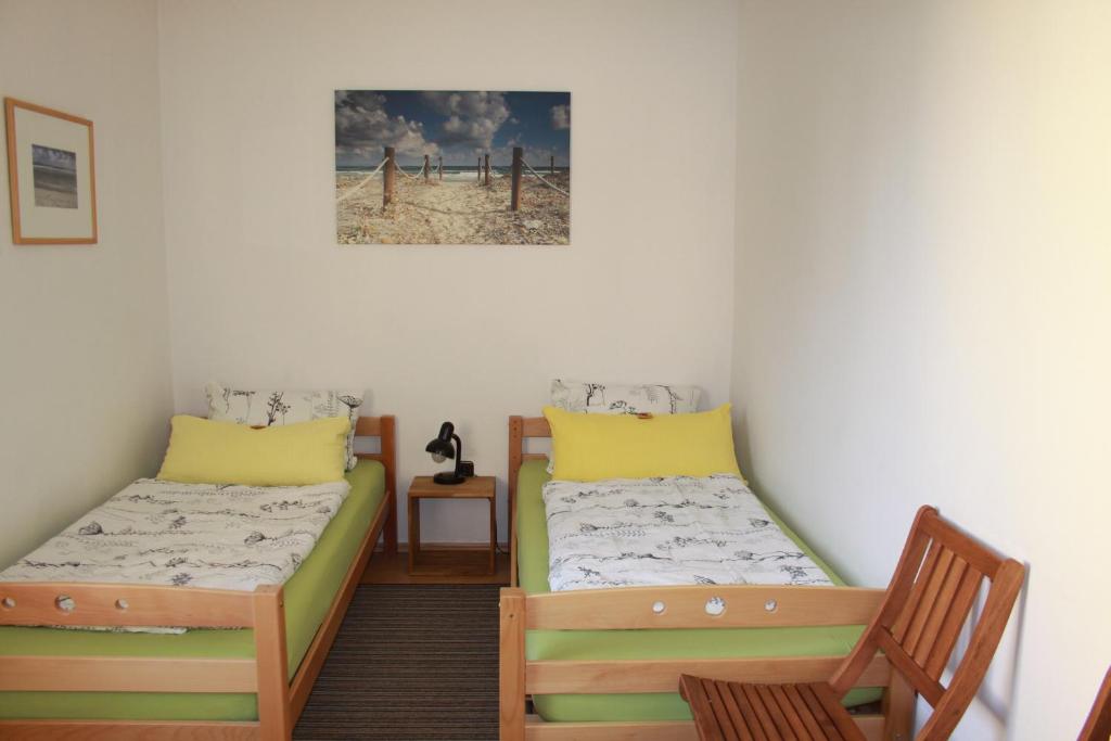 Postel nebo postele na pokoji v ubytování Apartments Eichenweg