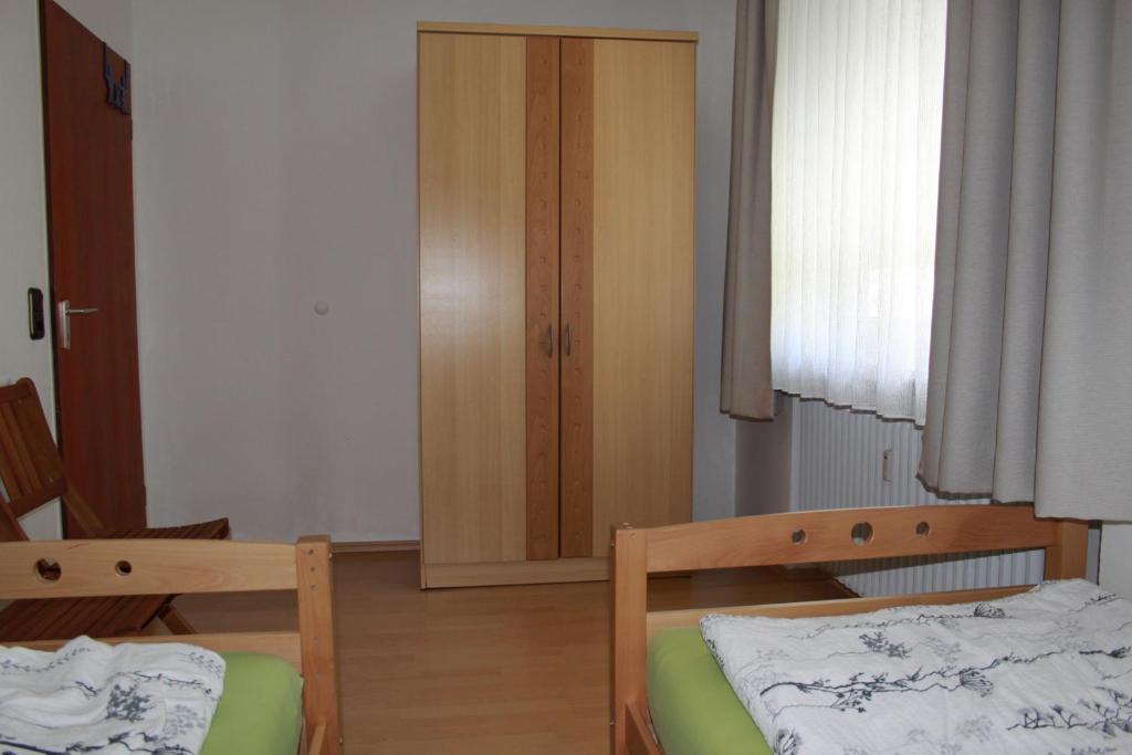 Postel nebo postele na pokoji v ubytování Apartments Eichenweg