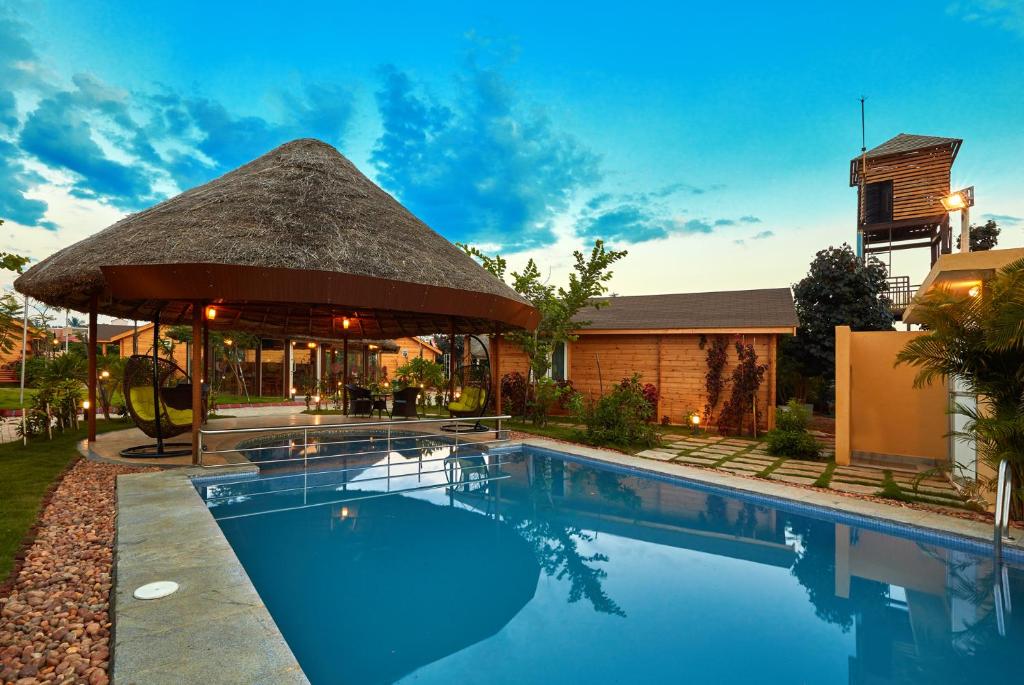 Bazén v ubytování Bodhiwoods Resorts nebo v jeho okolí