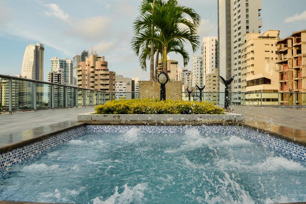 a swimming pool on the roof of a building at Apartamento Special For You in Cartagena de Indias