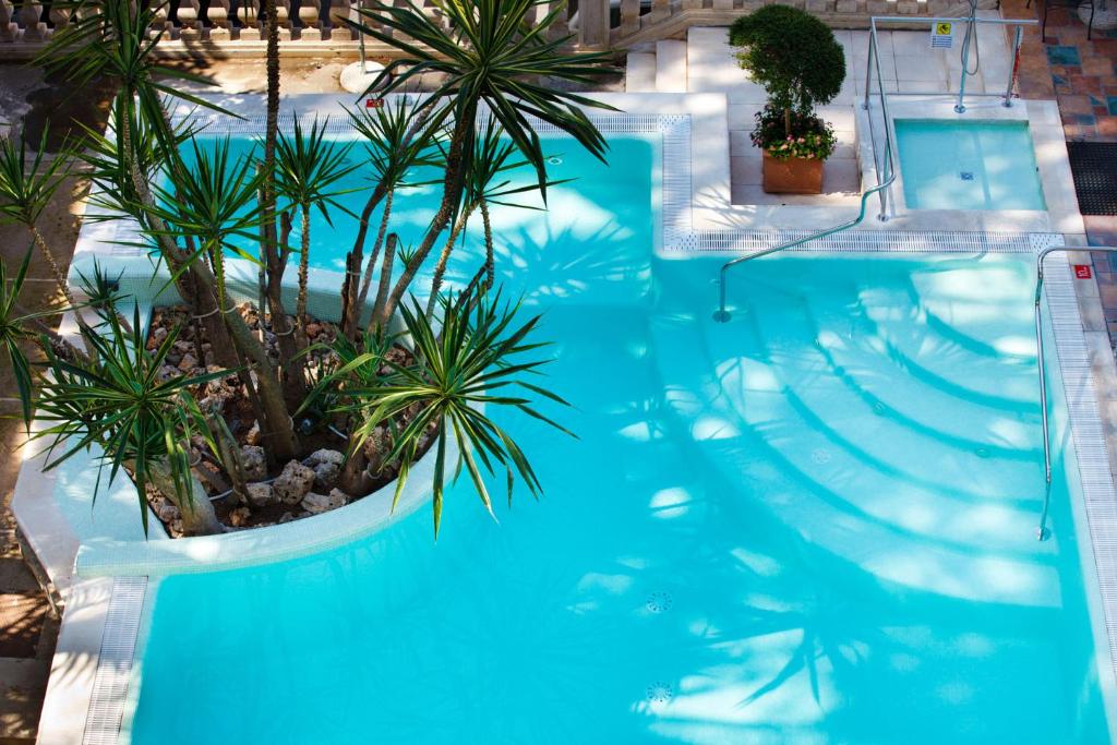 Bazén v ubytování Hotel Zi' Teresa nebo v jeho okolí