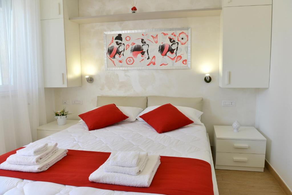 Postel nebo postele na pokoji v ubytování B&B Il FIORONE