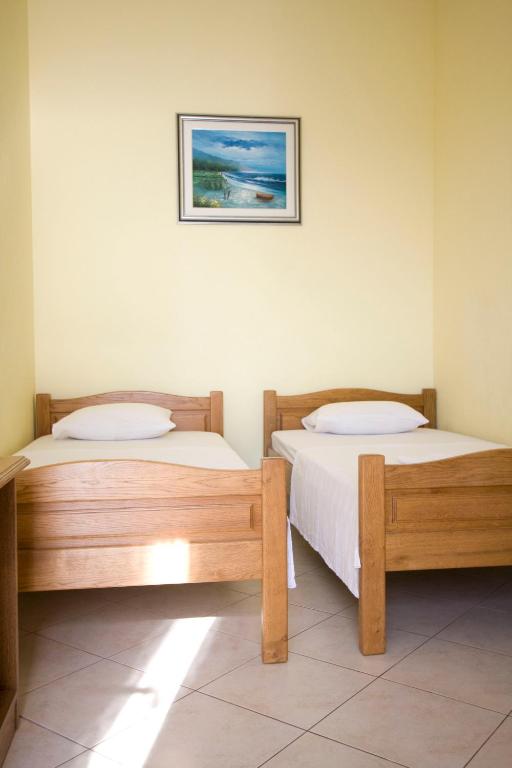 Posteľ alebo postele v izbe v ubytovaní Ella Apartments