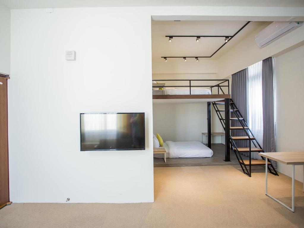Postel nebo postele na pokoji v ubytování Rainbow Hotel
