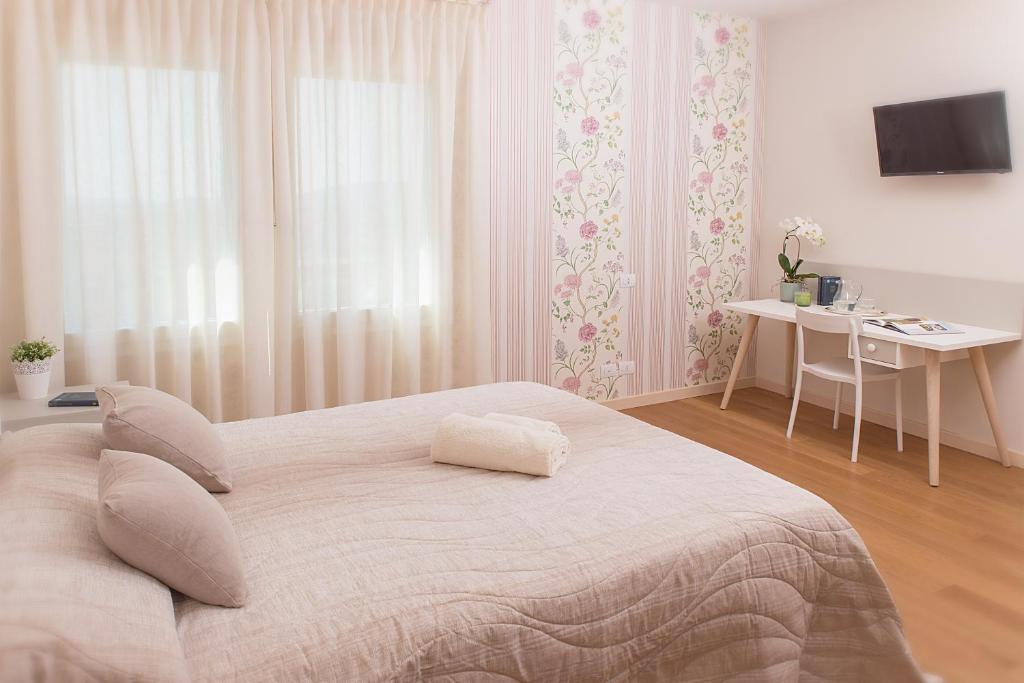Postel nebo postele na pokoji v ubytování B&B ALLE SCALETTE