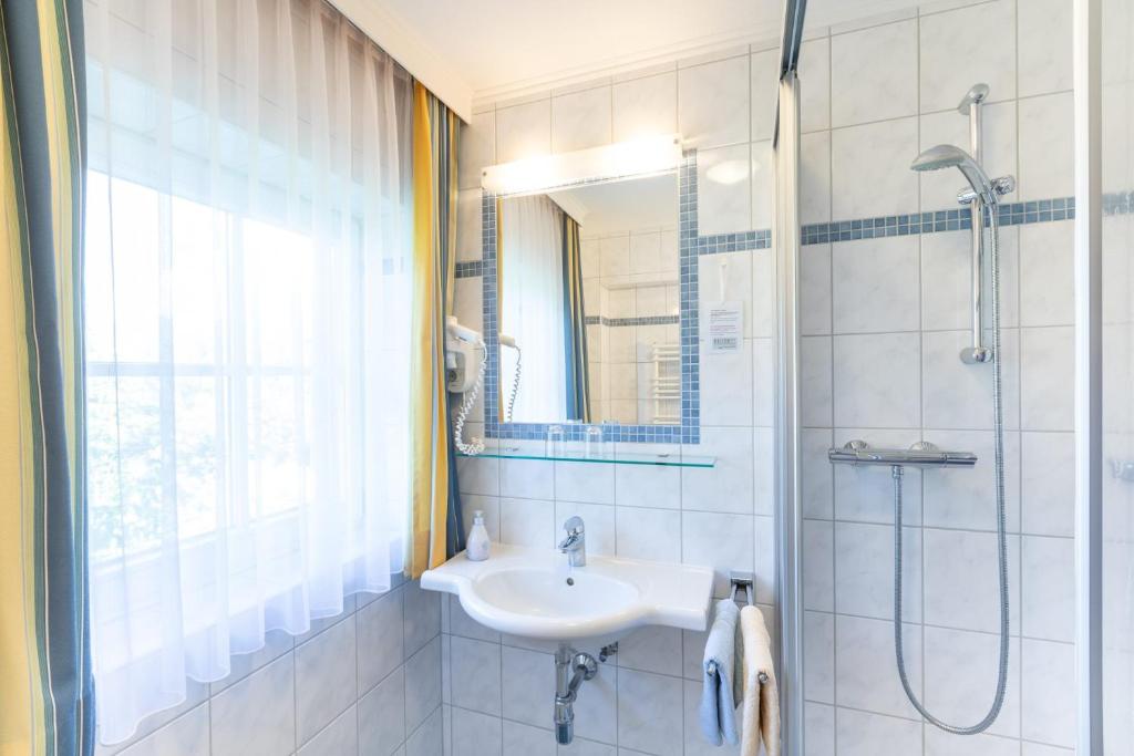 Koupelna v ubytování Reiters Wohlfühlhotel