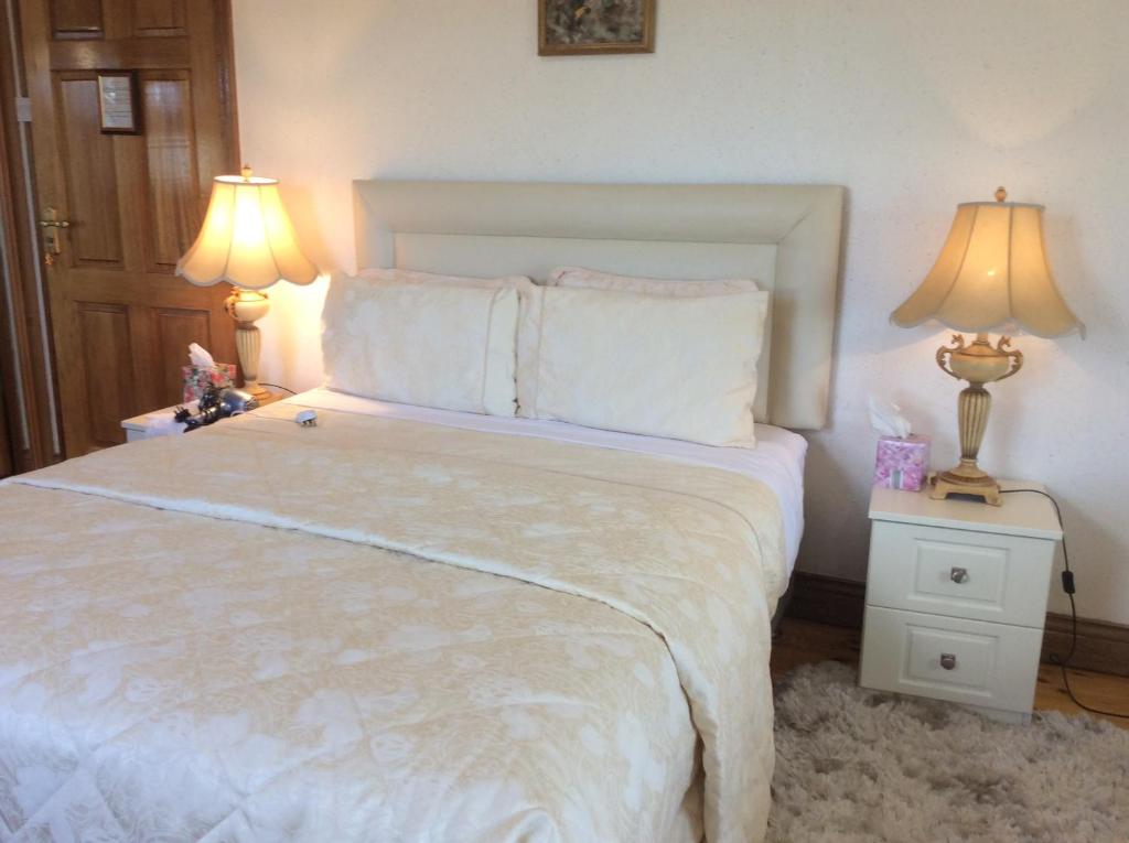 Postel nebo postele na pokoji v ubytování Rosdarrig Bed & Breakfast