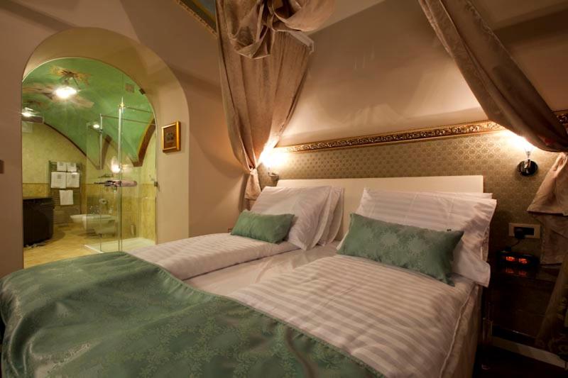 Voodi või voodid majutusasutuse Hotel Actum toas