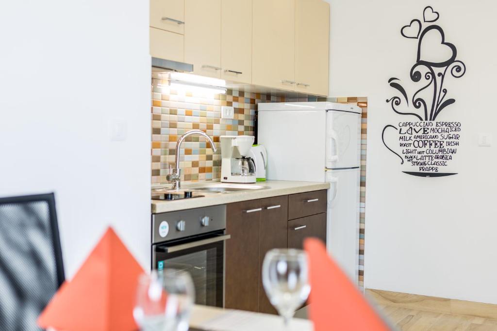 Kuchyň nebo kuchyňský kout v ubytování Apartments Franičević