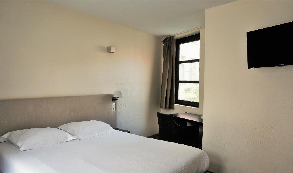 Postel nebo postele na pokoji v ubytování Hotel 't Putje