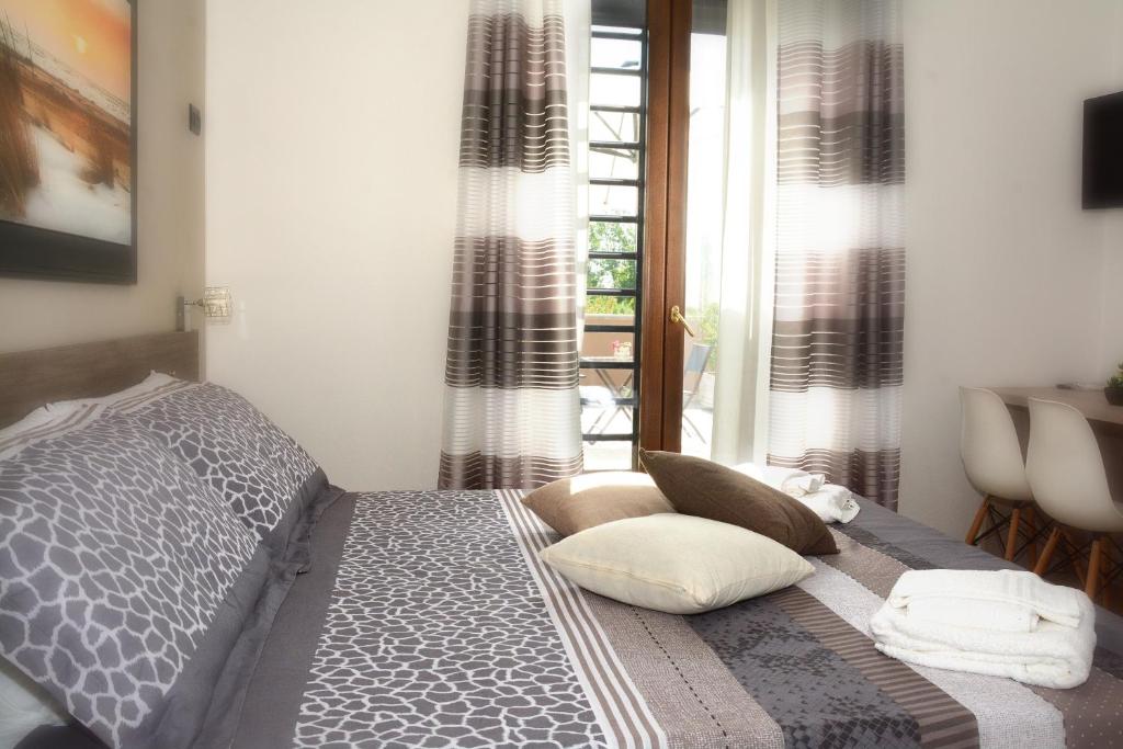Postel nebo postele na pokoji v ubytování Sylva Mala Home