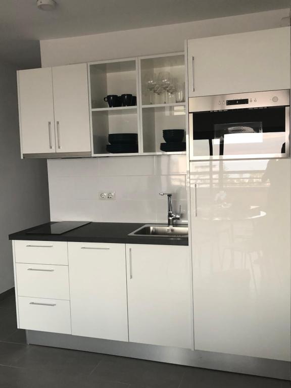 A kitchen or kitchenette at Luxury Apartment Playa del Ingles