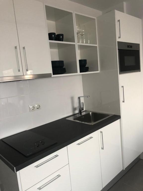 A kitchen or kitchenette at Luxury Apartment Playa del Ingles