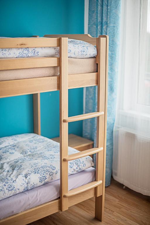 Postel nebo postele na pokoji v ubytování Hýbadlo
