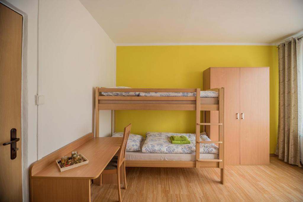 Postel nebo postele na pokoji v ubytování Hýbadlo