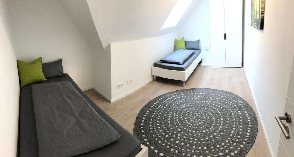 Postel nebo postele na pokoji v ubytování Auszeit am See