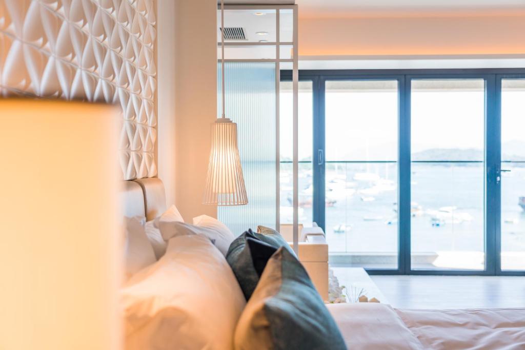 Voodi või voodid majutusasutuse The Pier Hotel toas