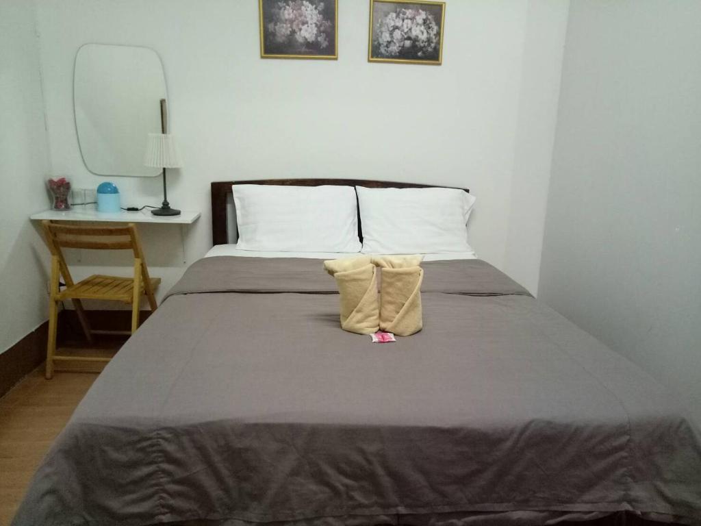 Voodi või voodid majutusasutuse TT Hostel Chiangrai toas