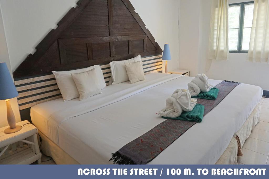 Кровать или кровати в номере Koh Chang Cliff Beach Resort