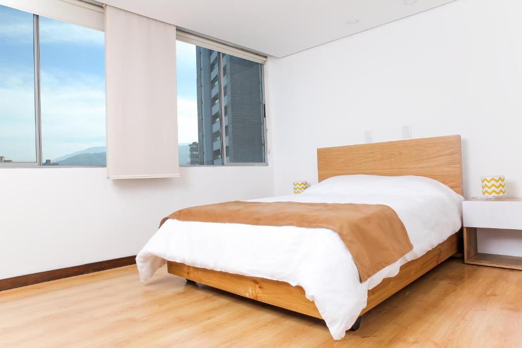 Postel nebo postele na pokoji v ubytování Apartamentos Poblado Alejandría by HOUSY HOST