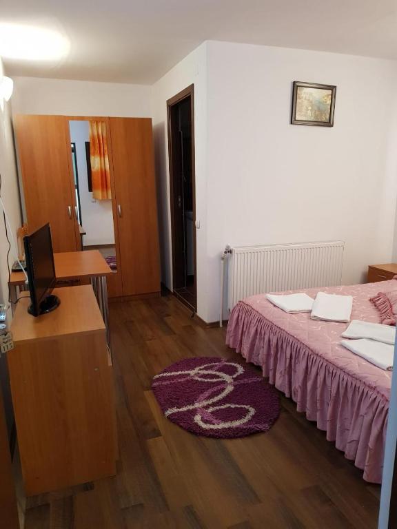 Postel nebo postele na pokoji v ubytování Hotel Magnolia