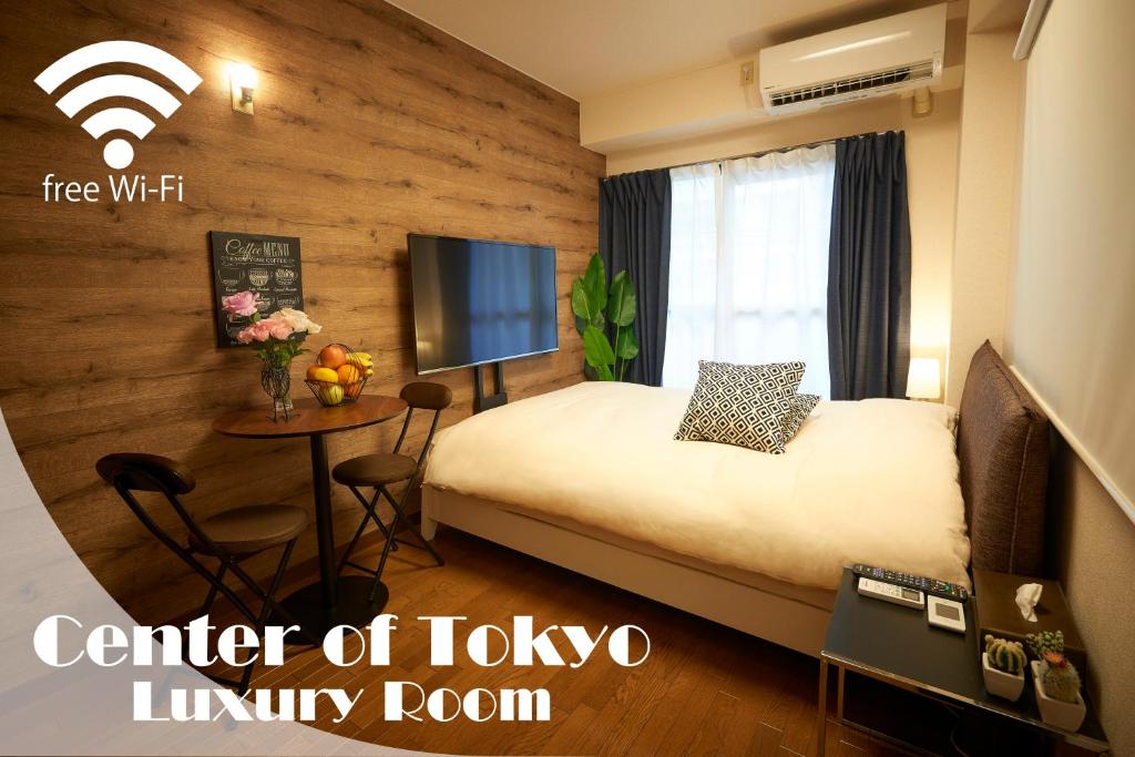 Postel nebo postele na pokoji v ubytování Garden Otsuka