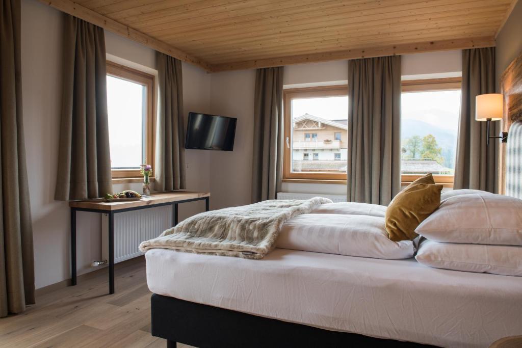 Postel nebo postele na pokoji v ubytování Hotel Winterbauer