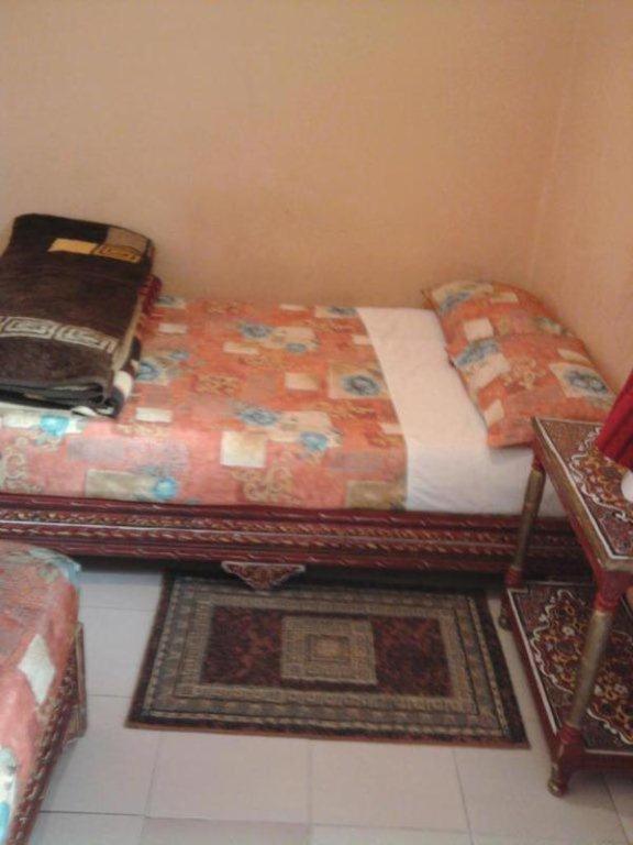 Postel nebo postele na pokoji v ubytování Hotel Aday