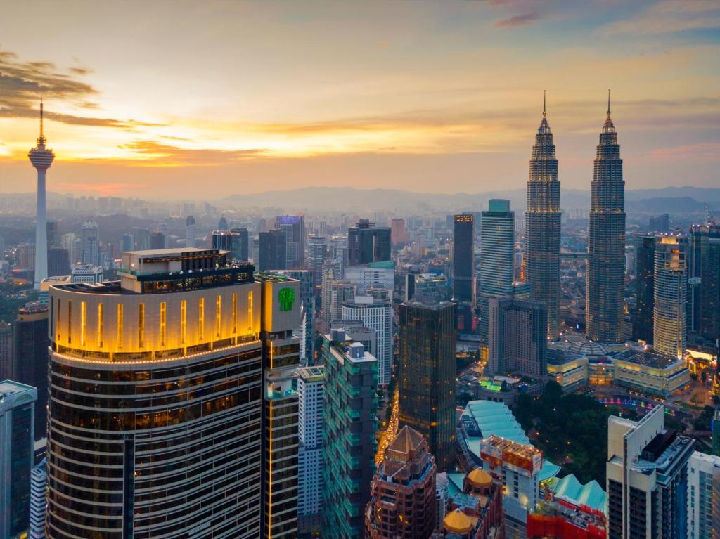 a view of a city skyline with tall buildings at Banyan Tree Kuala Lumpur in Kuala Lumpur